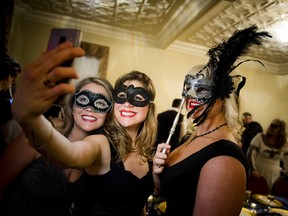 From left: Lindsay Knudson, Aldina Prefontaine and Holly Bogaerts take a selfie Saturday night.