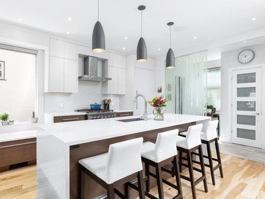 The kitchen was the main point of frustration for the homeowners. It was previously separated from the rest of the main floor but is now open-concept and allows a natural flow to the dining and living area.