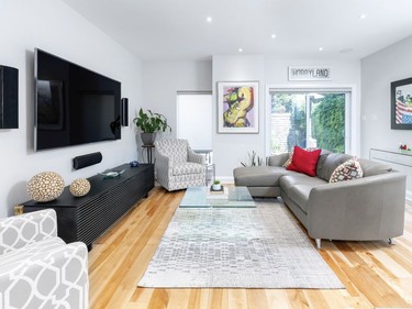 All of the art in the Centretown home is by Canadian artists and stands out against the soft grey walls. The homeowners and ARTium Design Build, alike, think the renovated house is reminiscent of an art gallery.