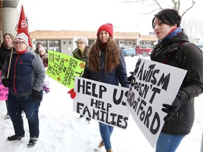 Parents and their supporters concerned about autism support participate in a rally in Sudbury, Ont. on Friday February 15, 2019.