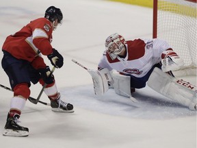 Florida Panthers centre Aleksander Barkov shoots and scores a highlight-reel goal from between his legs against Canadiens goaltender Carey Price during the second period of an NHL hockey game against the, Sunday, Feb. 17, 2019, in Sunrise, Fla.
