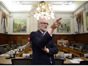 Auditor General Michael Ferguson waits to testify before the House of Commons public accounts committee on his spring audit of the government's employment training services for Indigenous Peoples on Parliament Hill in Ottawa on Monday, Oct. 29, 2018. Michael Ferguson, Canada's auditor general for the past seven years, has died. His office says Ferguson died surrounded by his wife, Georgina, and sons, Malcolm and Geoffrey.