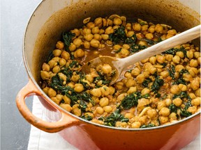 Chickpeas with Spinach, Chorizo, and Smoked Paprika. This recipe appears in "The Complete Mediterranean Cookbook."