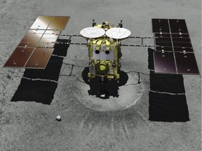 FILE - This computer graphic image provided by the Japan Aerospace Exploration Agency (JAXA) shows the Japanese unmanned spacecraft Hayabusa2 approaching on the asteroid Ryugu. Hayabusa2 is approaching the surface of an asteroid about 280 million kilometers (170 million miles) from Earth. The JAXA said Thursday, Feb. 21, 2019 that Hayabusa2 began its approach at 1:15 p.m.