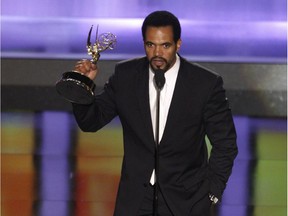 FILE- In this June 20, 2008, file photo Kristoff St. John accepts the award for outstanding supporting actor in a drama series for his work on "The Young and the Restless" at the 35th Annual Daytime Emmy Awards in Los Angeles. John has died at age 52. Los Angeles police were called to John's home on Sunday, Feb. 3, 2019, and his body was turned over to the Los Angeles County coroner. The cause of death was not available.