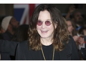 FILE - In this Sept. 28, 2015 file photo, Ozzy Osbourne poses for photographers upon arrival at the Pride of Britain Awards 2015 in London. ocker Ozzy Osbourne is in a hospital. Sharon Osbourne wrote on Twitter Wednesday, Feb. 6, 2019, the 70-year-old was admitted "following some complications from the flu." She wrote doctors believe "this is the best way to get him of a quicker road to recovery."