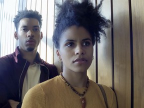 This image released by Netflix shows Melvin Gregg, left, and Zazie Beetz in a scene from "High Flying Bird."