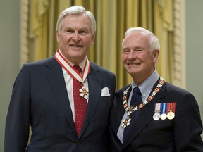 Governor General David Johnston stands with Michael Wilson after investing him as a Companion of the Order of Canada during a ceremony at Rideau Hall in Ottawa on November 17, 2010. Michael Wilson, a former politician, diplomat and longtime mental health advocate, has died at 81. The University of Toronto, where Wilson served as chancellor from 2012 to 2018, confirmed his death in a post on its website Sunday evening.