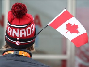 A Team Canada hat and flag.