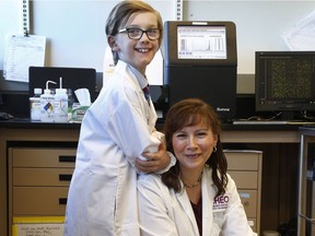 Eli Lincoln and Dr. Kym Boycott at the opening of the new Centre for Genomic Innovation at CHEO.