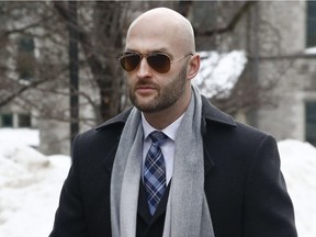 Const. Daniel Montsion arrives at court in Ottawa Tuesday Feb 5, 2019.  Montsion is charged with manslaughter, aggravated assault and assault with a weapon in the July 24, 2016, death of Abdirahman Abdi.