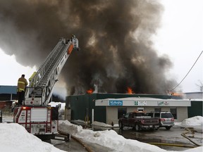 Ottawa Fire fight a blaze at 50 Bentley Ave in Ottawa Wednesday Feb 27, 2019.  Tony Caldwell