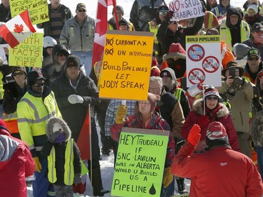 Hundreds of Pro-pipeline supporters arrived Alberta and other parts of the country in to protest against the Liberal government on Parliament Hill in Ottawa Tuesday Feb 19, 2019. Anti-pipeline supporters screaming at the Pro-pipeline supporters.