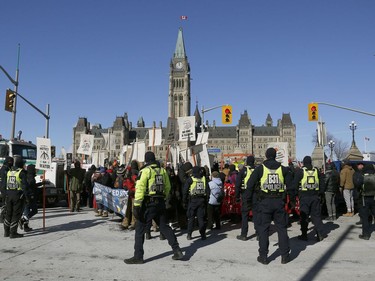 Hundreds of Pro-pipeline supporters arrived Alberta and other parts of the country in to protest against the Liberal government on Parliament Hill in Ottawa Tuesday Feb 19, 2019. Anti-pipeline supporters screaming at the Pro-pipeline supporters.