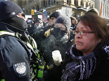 Hundreds of Pro-pipeline supporters arrived Alberta and other parts of the country in to protest against the Liberal government on Parliament Hill in Ottawa Tuesday Feb 19, 2019. Anti-pipeline supporters screaming at the Pro-pipeline supporters.