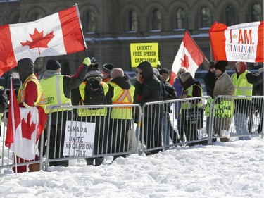 Hundreds of Pro-pipeline supporters arrived Alberta and other parts of the country in to protest against the Liberal government on Parliament Hill in Ottawa Tuesday Feb 19, 2019. Anti-pipeline supporters screaming at the Pro-pipeline supporters.