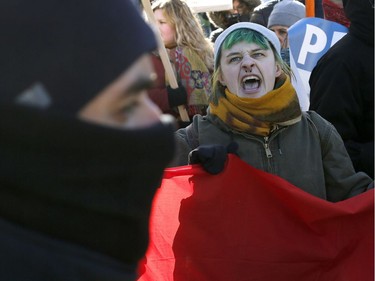 Hundreds of Pro-pipeline supporters arrived Alberta and other parts of the country in to protest against the Liberal government on Parliament Hill in Ottawa Tuesday Feb 19, 2019. Anti-pipeline supporters screaming at the Pro-pipeline supporters.