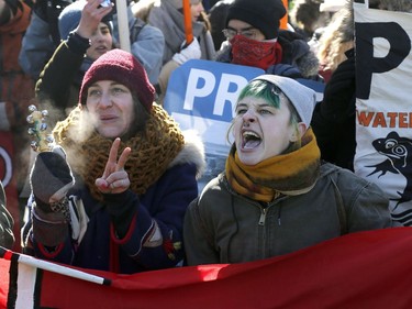 Hundreds of Pro-pipeline supporters arrived Alberta and other parts of the country in to protest against the Liberal government on Parliament Hill in Ottawa Tuesday Feb 19, 2019. Anti-pipeline supporters screaming at the Pro-pipeline supporters.