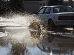 Deep puddles, often covering glassy ice, abound.