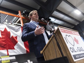 Conservative Leader Andrew Scheer speaks during a pro-pipeline rally. With the Liberals hurting themselves these days, what's the best strategy for the Official Opposition?