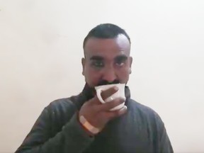 A screenshot taken from the video where pilot Abhi Nandan sips tea and praises the Pakistani army.