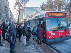 Students board a bus at Ottawa University. The needs of women and men are different when it comes to public transit.