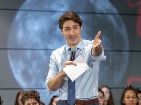 Prime Minister Justin Trudeau speaks to high school students at the Canadian Space Agency headquarters on Feb. 28, in St. Hubert, Que.