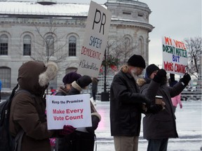 In this file photo,  demonstrators gathered to protest the Trudeau government reneging on its promise of electoral reform in 2017.