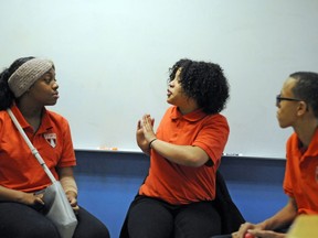 In this Nov. 15, 2018 photo, students participate in a Youth Aware of Mental Health session at Uplift Hampton Preparatory School in Dallas. University of Texas Southwestern Medical Center offers the program to schools to help educate students about mental health and suicide prevention. Part of the program includes the students participating in role-playing sessions to help them understand the issues being discussed.