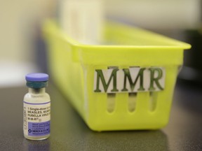 A measles, mumps and rubella vaccine is seen on a countertop at a pediatrics clinic in Greenbrae, Calif. on Feb. 6, 2015. The Public Health Agency of Canada has issued a statement aimed at reminding Canadians that measles is a serious and highly contagious disease and that getting vaccinated is the best protection.