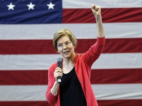 FILE - In this Jan. 12, 2019, file photo, Sen. Elizabeth Warren, D-Mass., speaks during an organizing event at Manchester Community College in Manchester, N.H. Warren is expected to formally launch her presidential bid on Saturday with a populist call to fight economic inequality.