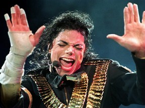 In this file photo taken on Aug. 31, 1993, US pop megastar Michael Jackson performs during his "Dangerous" tour in Singapore.