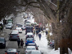People gathered on Russell Ave in Sandy Hill Sunday March 17, 2019, to celebrate Saint Patrick's Day. Ottawa police, fire, paramedics and bylaw were all keeping a close eye on the revellers Sunday.   Ashley Fraser/Postmedia