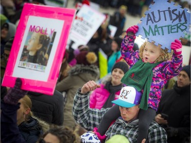 The Next Step Autism March, organized by two autism parents in Barrhaven, made its way to Parliament Hill Sunday March 30, 2019. Five-year-old Zikayla Miehm on her father, Jason Miehm, shoulders during the speeches Sunday afternoon.   Ashley Fraser/Postmedia