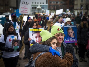 The Next Step Autism March, organized by two autism parents in Barrhaven, made its way to Parliament Hill Sunday March 30, 2019. Ontario Autism Coalition president Laura Kirby-McIntosh and her daughter 16-year-old Clara Kirby-McIntosh share a moment together during the speeches Sunday afternoon.