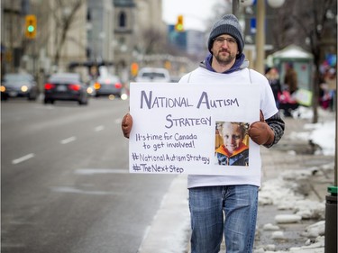 The Next Step Autism March, organized by two autism parents in Barrhaven, made its way to Parliament Hill Sunday March 30, 2019. Adam Brousseau walks down Wellington Street, making his way to Parliament Hill Sunday afternoon.