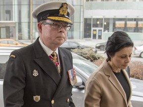 Vice Admiral Mark Norman, left, arrives to an Ottawa court with his lawyer, Marie Henein, for his first appearance after being charged with one count of breach of trust.