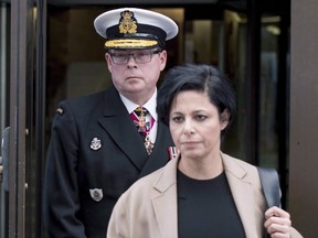 Vice-Admiral Mark Norman follows his lawyer Marie Henein as they leave the courthouse in Ottawa.