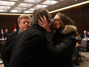 Gerald Butts, former principal secretary to Canada's Prime Minister Justin Trudeau, receives a kiss from his wife Jody after testifying at the House of Commons justice committee on Parliament Hill in Ottawa on March 6, 2019 in Ottawa.