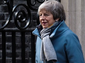 British Prime Minister Theresa May leaves Downing Street on March 14.