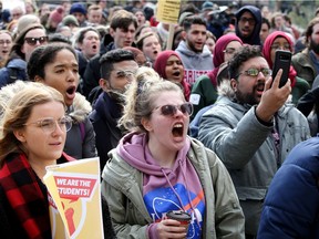 Third-year political science major Gabrielle Fawcett (centre) screams during a walkout of about 100 students at Carleton University Wednesday (March 20, 2019) afternoon. They were part of a planned province-wide protest by students against changes to post-secondary funding by the provincial government.