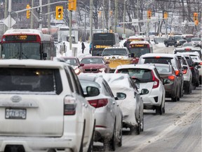 Rush hour traffic congestion along Albert Street near Preston Street after another snowfall in Ottawa. January 29, 2019.