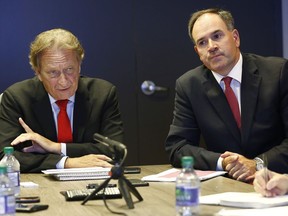 Ottawa Senators owner Eugene Melnyk and general manager Pierre Dorion.