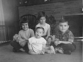 This family photo was taken shortly before Catherine McKercher's brother, Bill, was institutionalized. From left: Catherine McKercher, her brother Bill, sister Mary and brother Bob.
