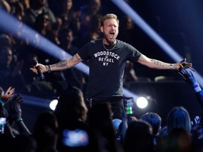 Canadian Music Hall of Fame recipient Corey Hart performs "I wear my sunglasses" during the Juno Music Awards at Budweiser Gardens in London, Ont., on March 17, 2019. (LARS HAGBERG/AFP/Getty Images)