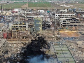 An aerial view shows damaged buildings after an explosion at a chemical plant in Yancheng in China's eastern Jiangsu province early on March 22, 2019. - Chinese President Xi Jinping ordered local governments on March 22 to prevent any more industrial disasters after a chemical plant blast left 47 people dead, injured hundreds and flattened an industrial park in the latest such catastrophe to hit the country.