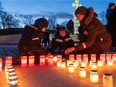People light candles in Tallinn, Estonia on March 25, 2019 to commemorate the tens of thousands of victims of the deportation march when, from March 25 to 28, 1949, more than 22,000 people in Estonia alone were forced from their homes and deported east. Many never returned.