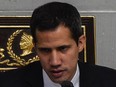 Venezuelan opposition leader and self-proclaimed interim president Juan Guaido speaks during a session of the National Assembly in Caracas on March 26, 2019.