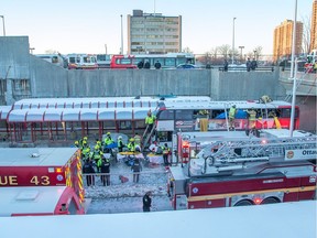 First responders attend to victims of a horrific rush hour bus crash at the Westboro Station near Tunney's Pasture.  Photo by Wayne Cuddington/ Postmedia    ADDITIONAL INFORMATION: Ottawa January 11, 2019