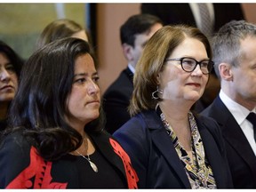Liberal ministers Jody Wilson-Raybould and Jane Philpott take part in the first, now-infamous cabinet shuffle at Rideau Hall in Ottawa on Jan. 14.